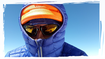 Man in high altitude mountaineering clothing