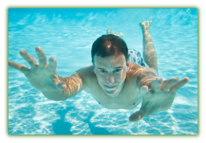 Man swimming in pool