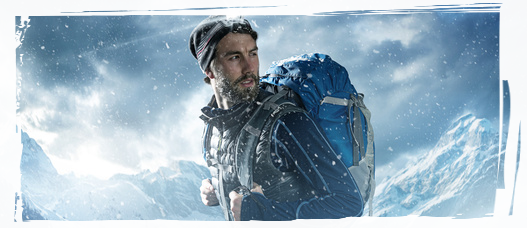 Man in snowy mountains