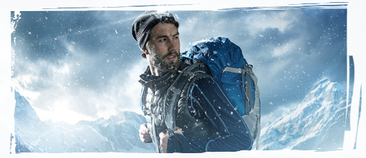 Ultimate Mountaineering Man in snowy mountains