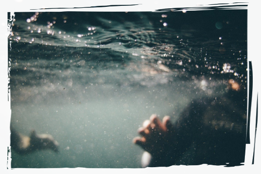 People swimming underwater