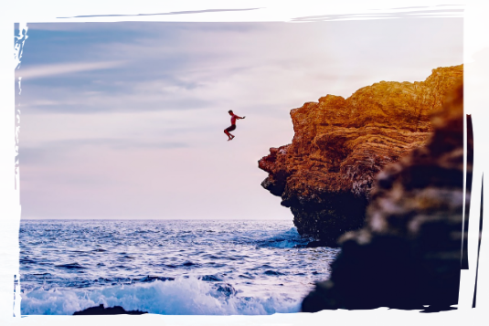 Tough Coasteering Person Jumpting into the sea