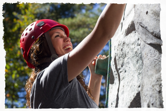 Woman climbing outdoors